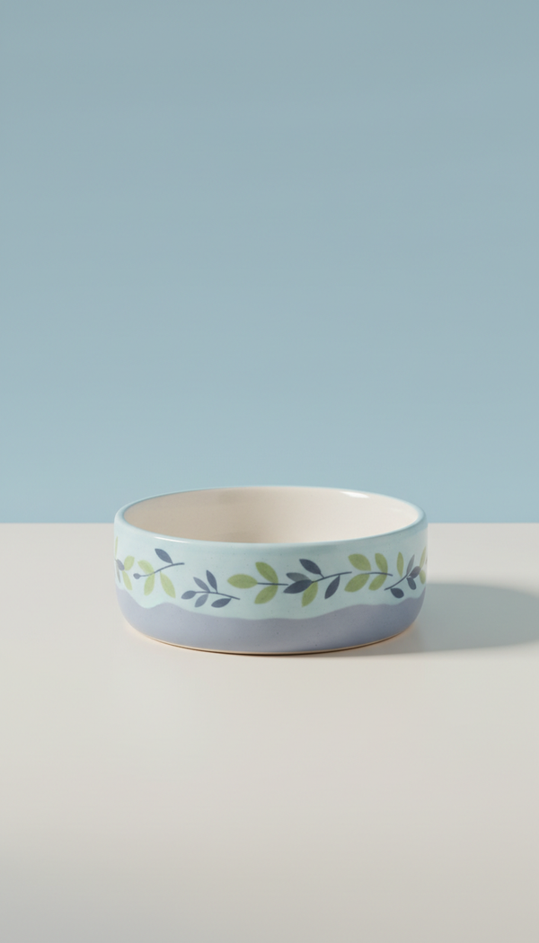 Ceramic pet food bowl with weighted base